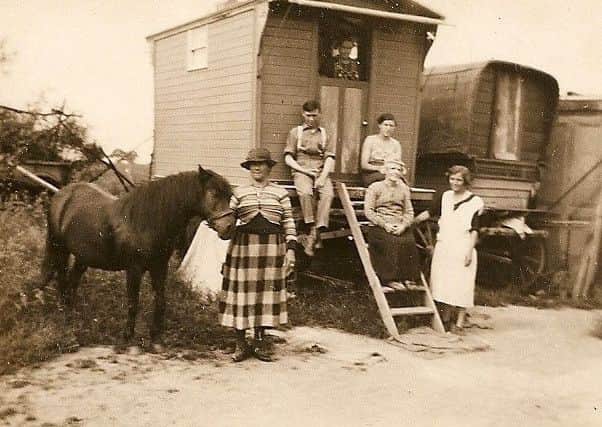 Caravans at Hoe Wood Rest, Small Dole, about 1932. In the doorway: Dolly Tidy; seated: Tom Tidy, Aunt Nell and Nancy. Standing: Granny Tidy (Sarah) and Granny Sharpe (Ethel)