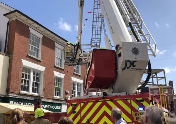 An aerial ladder was used to look at the roof. Pictures: Contributed