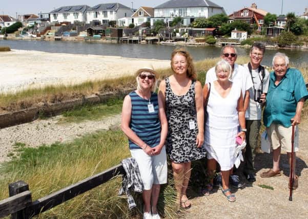 Members of World of Widewater community and conservation group at the lagoon in Lancing