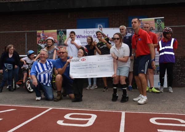 NWSS present the cheque to Horsham Wheels for ALL