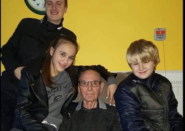 Arianne with her grandad, Ted, and two brothers Josh Phillips (left) and Loui Heath (right)