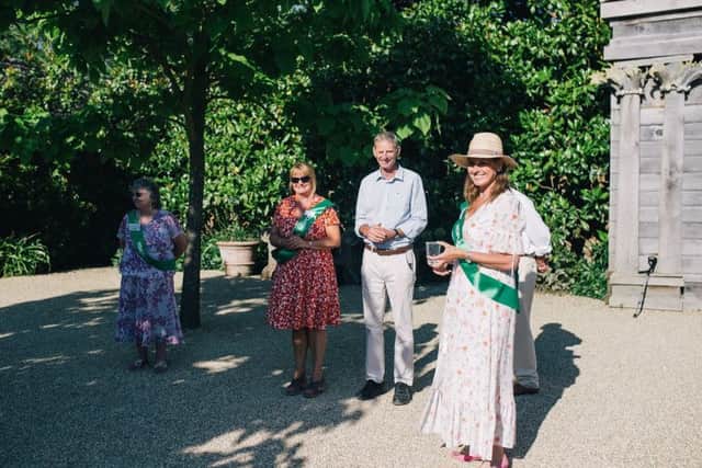 The Duchess of Norfolk, Georgina Fitzalan-Howard, with head gardener Martin Duncan and Tina Gard, Lancing district chairman