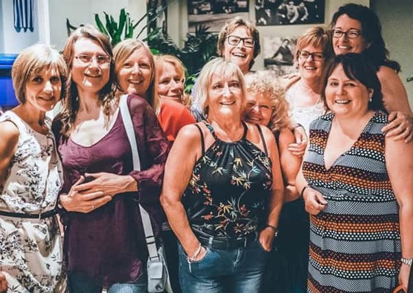 A group photo of the friends with Michelle, taken at their last gathering, just before she was taken ill, from left, Caroline Faller, Mich Jukes, Karen Clarke, Jacqui Edwards, Marion Craig, Sandra Cobden, Mo Prevett, Karen Milner, Jude Loach and Michelle Elliott, front right
