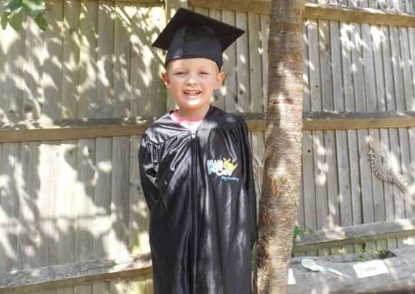 One of the children on their graduation day