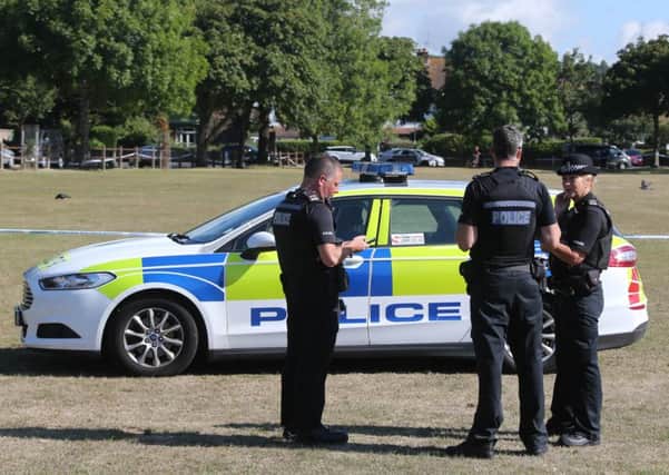 The green was cordoned off as police searched the scene. Photo: Eddie Mitchell