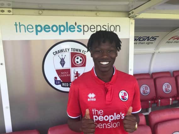 Crawley Town have signed David Sesay on a two-year deal