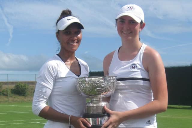 Ladies' singles finalists Sam Martinelli (right) and Erica Oosterhout.