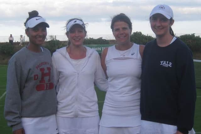 The ladies' doubles finalists.