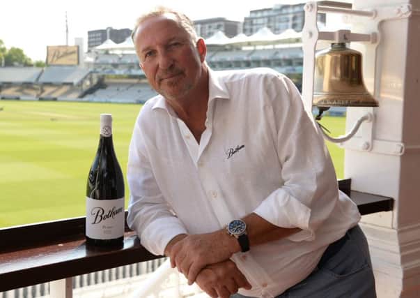 Sir Ian Botham OBE with one of his wines at Lords. Picture by Philip Brown