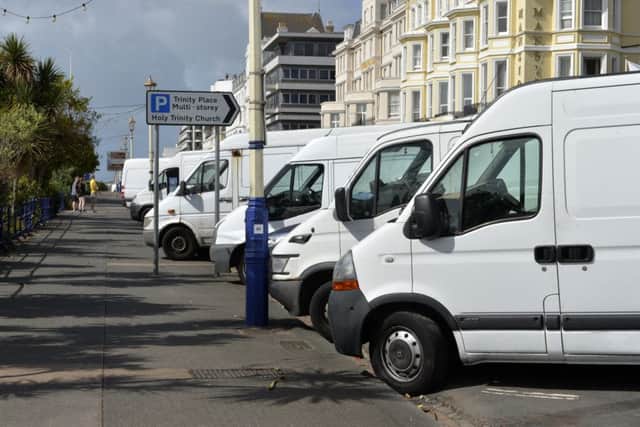 Market stall vendors' vans parked on Grand Parade on Eastbourne seafront (Photo by Jon Rigby)