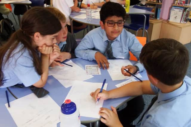 Hawthorns Primary School pupils completing maths problems