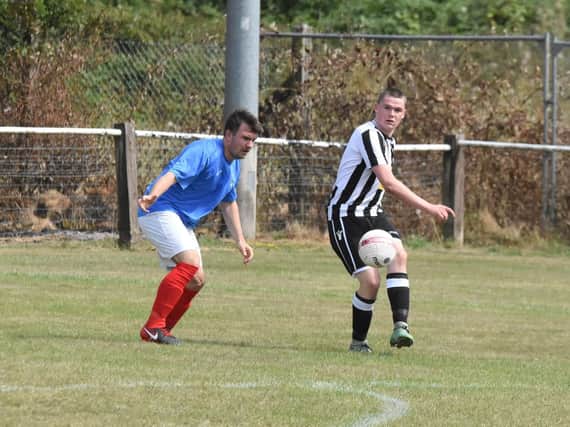 Action from Littlehampton Town's clash at St Francis Rangers. Picture by Grahame Lehkyj