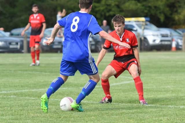 Action from Saturday's match between Hassocks and Broadbridge Heath. Picture by Liz Pearce