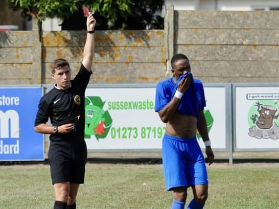 Shoreham striker Kai Bichard is given his marching orders in the defeat to Little Common. Picture by Stephen Goodger