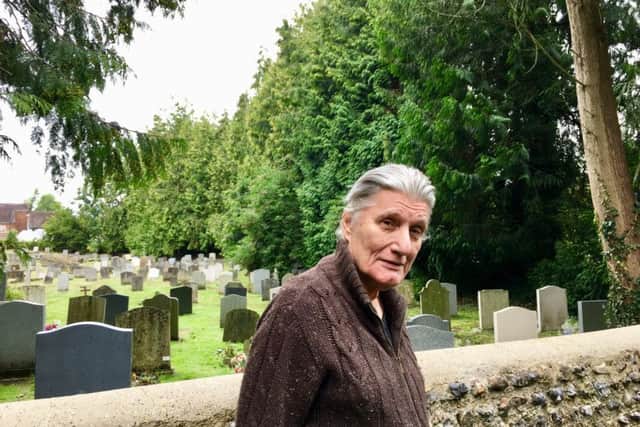 John Gibson from The Thatchway, Angmering, in front of the 45 trees which are to be chopped down in the St Margaret's Church graveyard