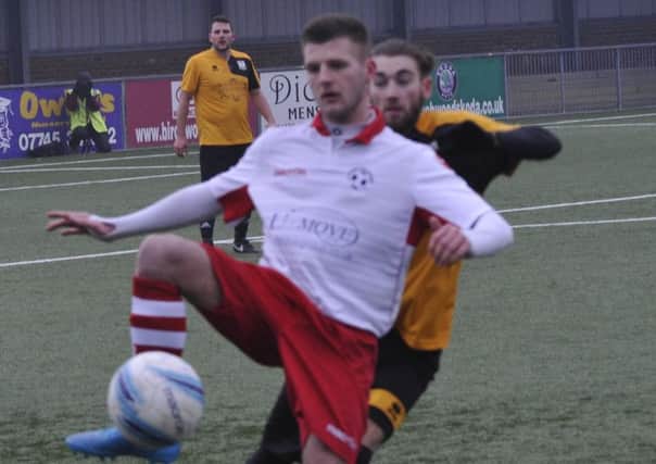 Jamie Bunn, pictured here playing against Bexhill United for Langney Wanderers last season, impressed on his debut for the Pirates against Alfold.
