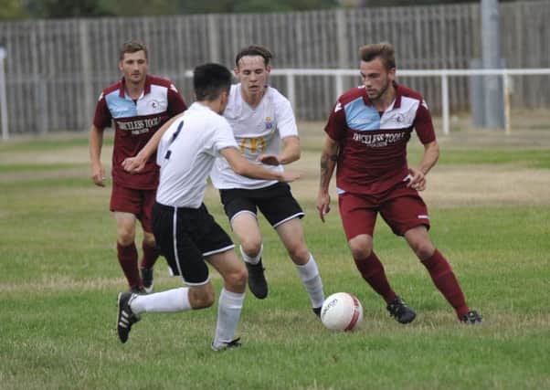 Harry Saville on the ball during Little Common's 4-0 win over Eastbourne United AFC. Pictures by Simon Newstead