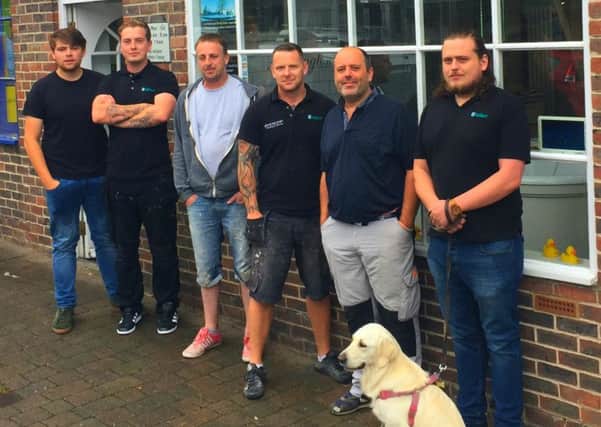 From right, showroom manager Dan Hart with 'apprentice' Bobbi, managing director Spencer Hart and supervisor Paul Stammers with the rest of the team outside the showroom in High Street, Steyning