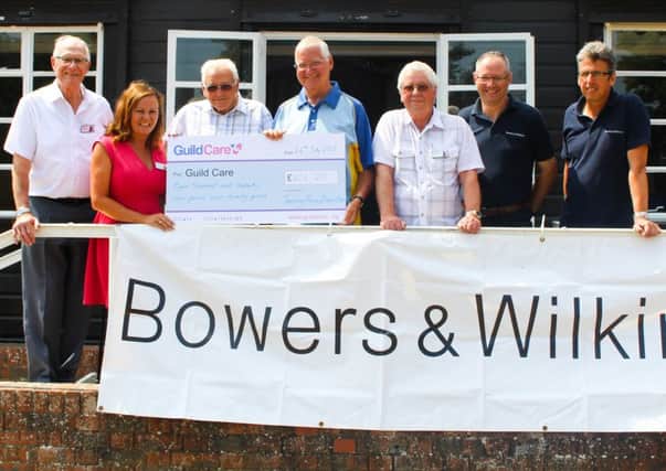 Tarring Priory Bowls Club members presenting the cheque for Guild Care