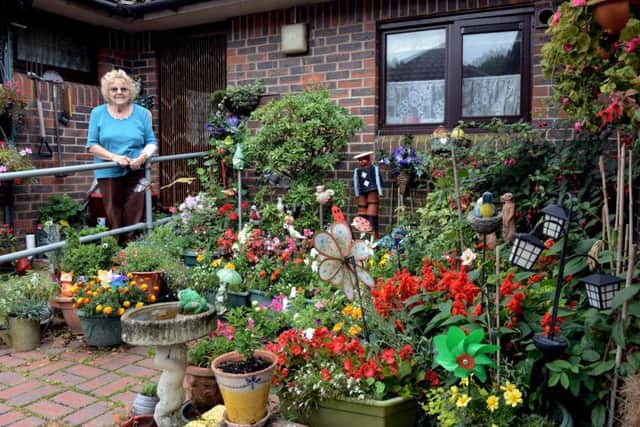 Hida Wilds, 90, with her garden at Dinemans Court, one of the runners-up. Picture: Kate Shemilt ks180389-3