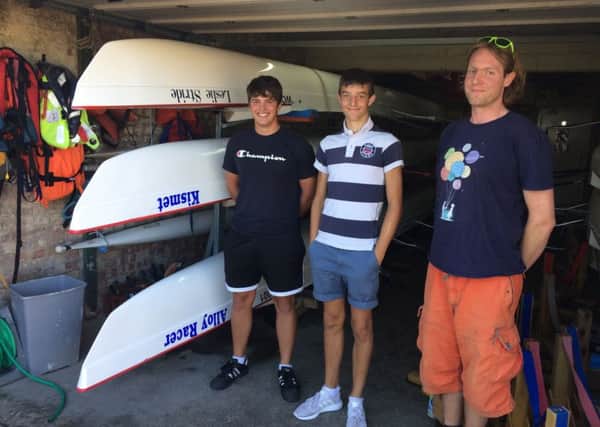 Young members of the rowing club help rescued the girl from the water