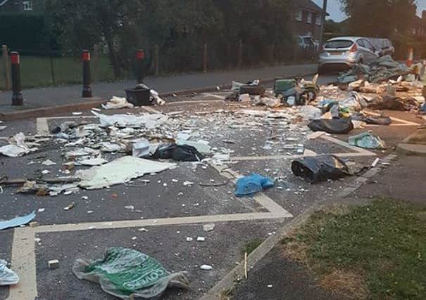 Police were alerted to the waste dumped in the middle of a Haywards Heath road