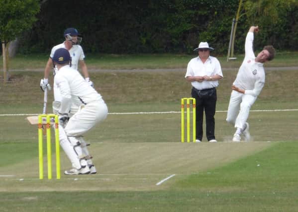 Joe Sarro bowling for Bexhill. Pictures by Simon Newstead