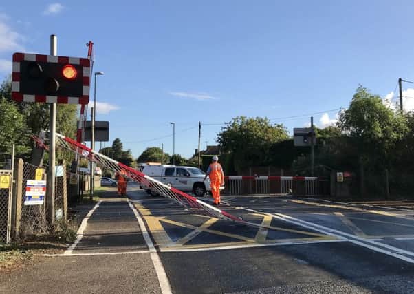 Damage to the Woodgate level crossing. Pictures: Eddie Mitchell
