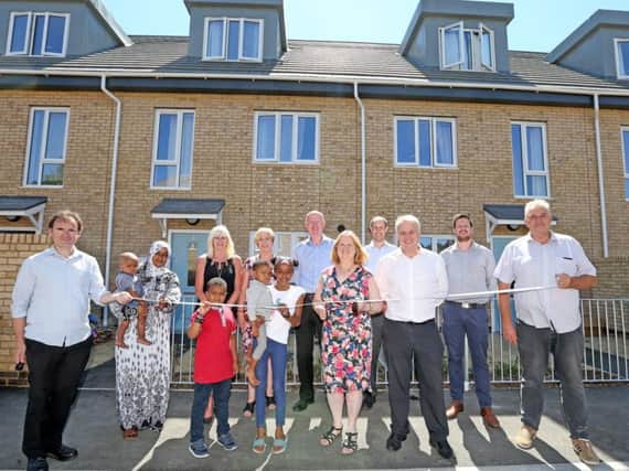 Cllr Anne Meadows with residents, council staff and contractors at the opening of the Hollingdean homes