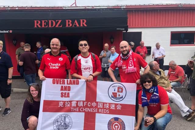 our Chinese Super fan Sam outside Redz Bar, complete with his Crawley Town flag mixing with fellow Reds fans before the Stevenage game. From left to right, Vicky, Steve, Sam, Matt and Adam.