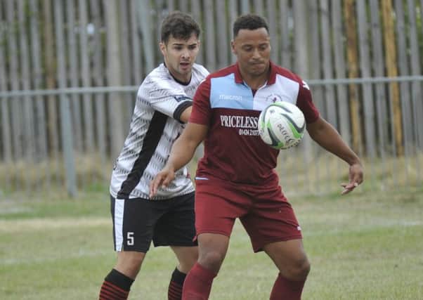 Little Common midfielder Wes Tate brings the ball under control during the 2-2 draw against Bedfont Sports. Pictures by Simon Newstead