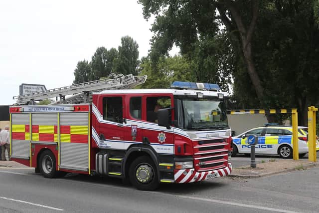 Emergency services at the scene on Saturday. Photo: Eddie Mitchell