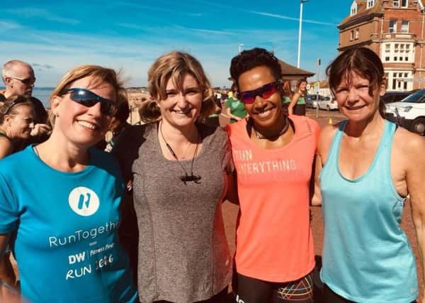Dame Kelly Holmes (second-right) with Run Together's Jess Austen, Jacqueline Scott and Karen Williams at the Hastings parkrun on Saturday.
