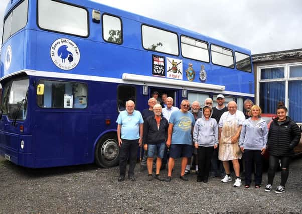 Men in Sheds and Danny Gallivan trust work on a  bus - intended to be a homeless shelter in Crawley. Pic Steve Robards SR1820797 SUS-181208-154735001