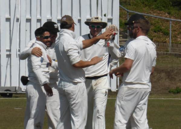 Hastings Priory v Roffey cricket action - Roffey celebrate claiming a wicket SUS-181108-225433002