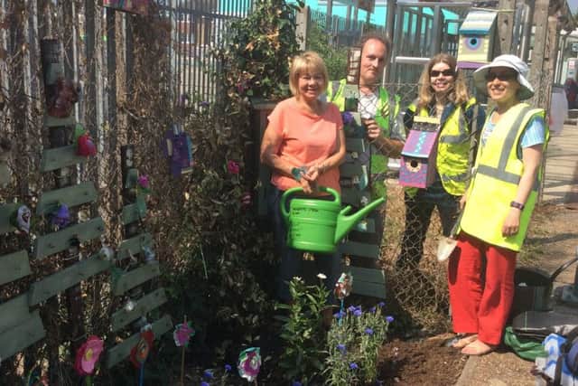 The Men in Sheds group has worked with Art for All to design and make wooden trees from pallets as part of Friends of Angmering Station's new Sidetracked art project
