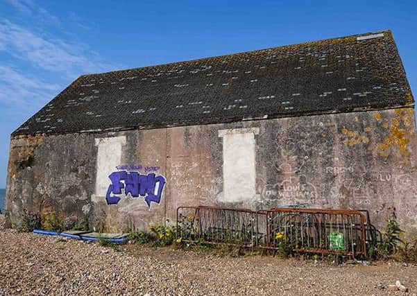 Police have released this image of the Mary Stanford Lifeboat House at Rye Harbour in the hope of people coming forward with information about who caused the damage. Picture supplied by Sussex Police