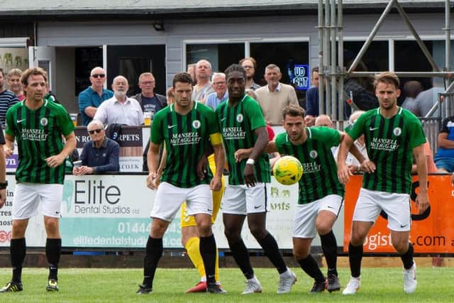 Burgess Hill Town defend a free-kick against Potters Bar on Saturday.  Picture by Chris Neal