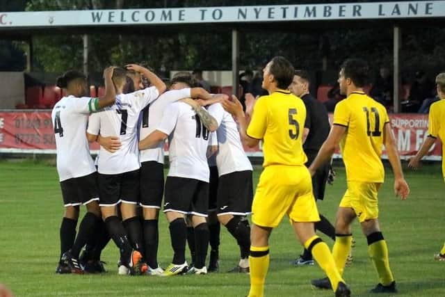 Pagham celebrate after Dan Simmonds' opener / Picture by Roger Smith