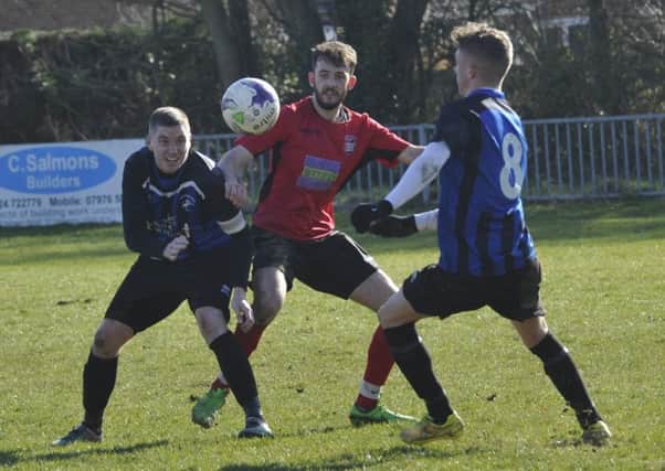 Hollington United in action against Rye Town last season. Picture by Simon Newstead