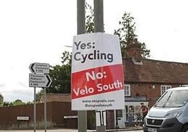 Posters were put up by campaigners hoping to stop Velo South, a 100-mile cycling event.