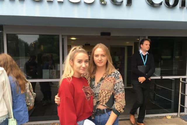 Taylor Setterfield (left) and Agnese Sproge outside the college