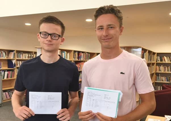 Newman College students Aaron Andrews and Dan Karadzas both got three A stars