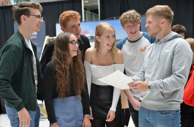 Students from Sussex Coast College collect their results
