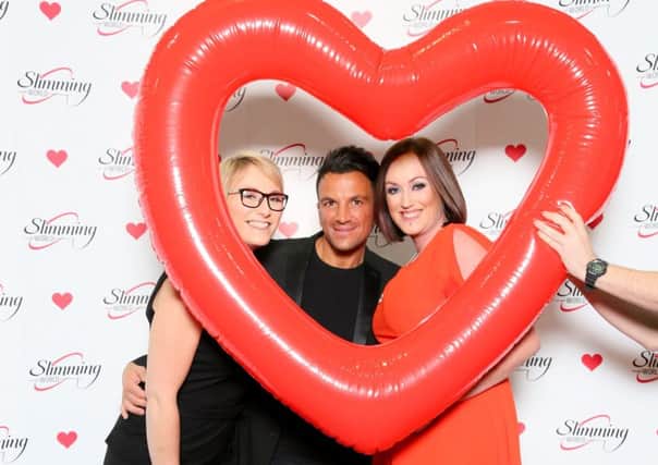 Michelle Ferris-Talbot and Robyn Gatland, Slimming World consultants, with singer Peter Andre at the annual awards event