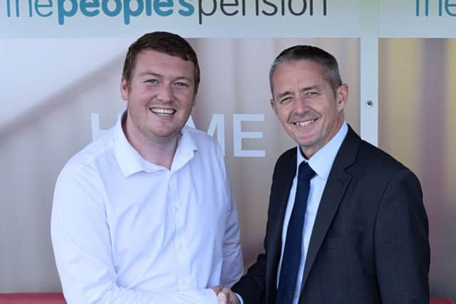 Commercial manager Joe Comper, left, with Patrick Heath-Lay, chief executive officer of the Peoples Pension. Picture courtesy of Crawley Town. SUS-180625-125233002