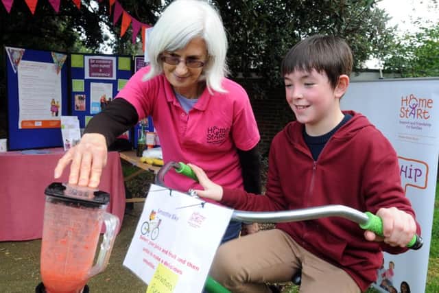 Gabrielle Tappin pictured in 2015 with Elliott Day, 11, making a fruit smoothie powered by cycling ks1500555-7