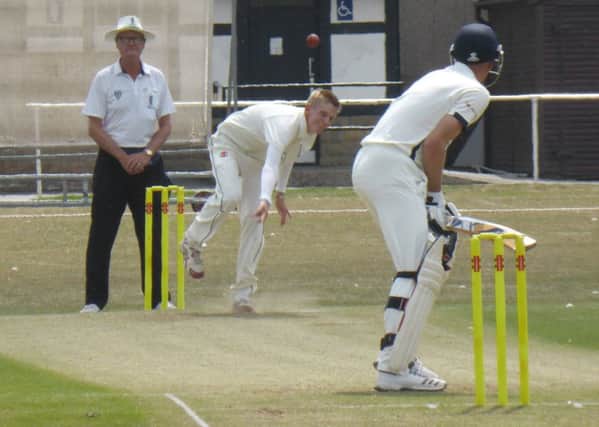 Byron Smith bowling for Bexhill in their last home, against Billingshurst, a fortnight ago. Picture by Simon Newstead