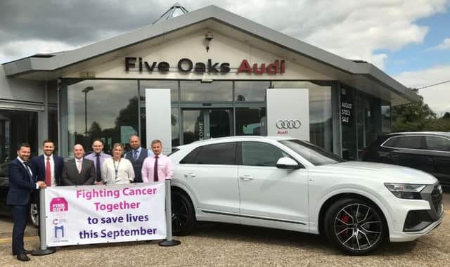 Luke Sanson and his team and the new Audi Q8