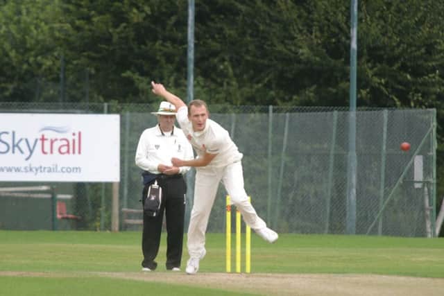 Jamie Thornely bowling for Horsham CC 1st XI. Photo by Clive Turner